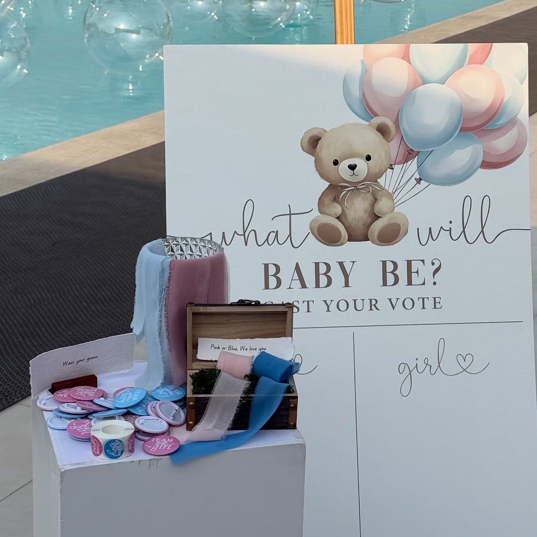 Pool Side Gender Reveal Mystery Box Setup with Floating Pool Balloons